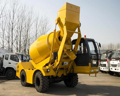 Self loading concrete mixer type